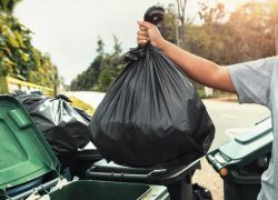 woman-hand-holding-garbage-in-black-bag-for-cleaning-in-to-trash-free-photo woman-hand-holding-garbage-in-black-bag-for-cleaning-in-to-trash-free-photo